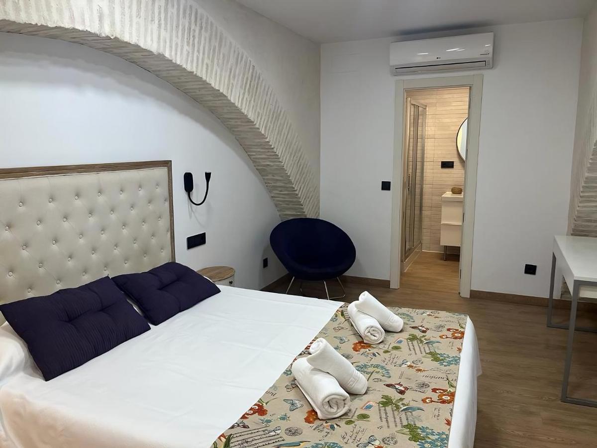 Apartamentos Living Sevilla Centro Maestranza Bagian luar foto