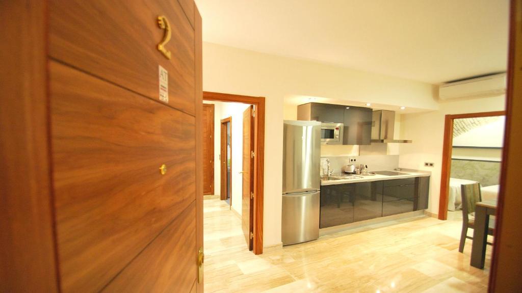 Apartamentos Living Sevilla Centro Maestranza Ruang foto