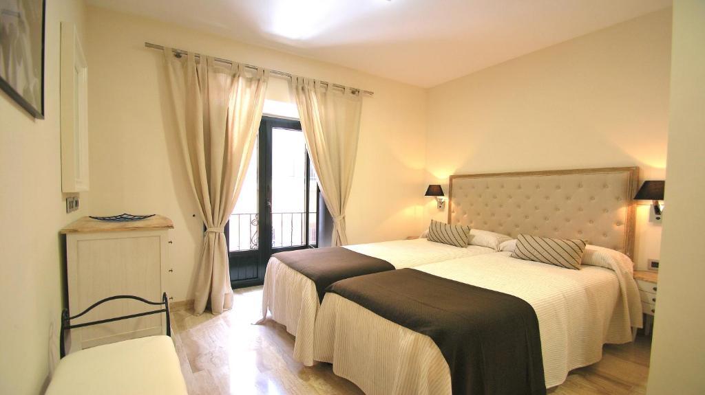 Apartamentos Living Sevilla Centro Maestranza Ruang foto